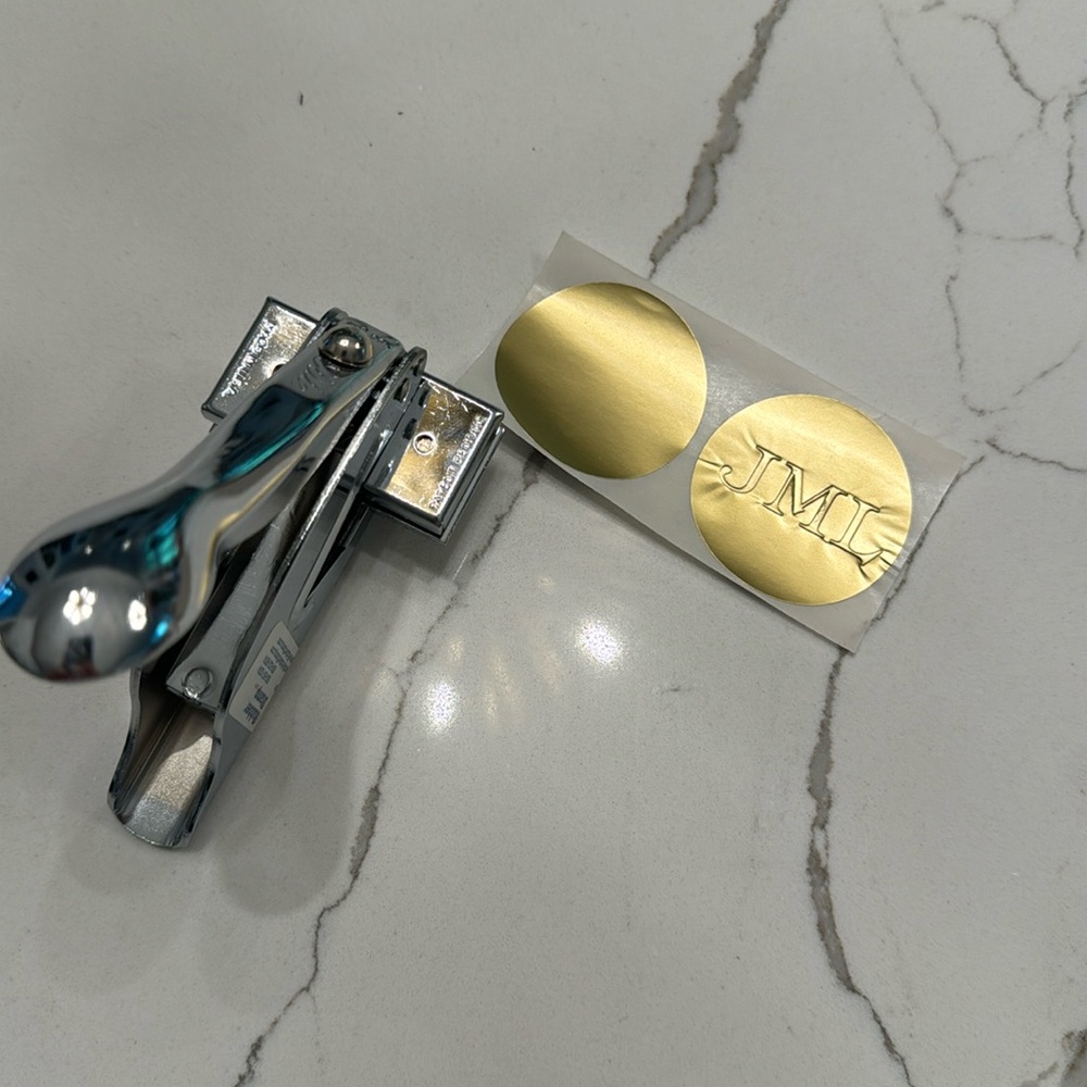 Personal Embosser with initials JML
